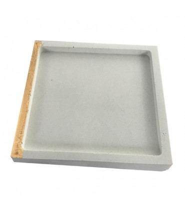 Vide-poche en béton blanc.